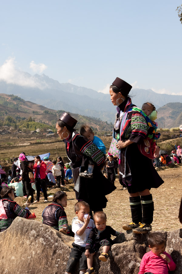 Black Hmong women and babies at the Rice Festival