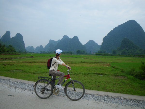 Heidi bicycling in Yangshuo