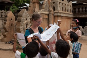 Kids Trying to Sell Their Drawings Outside a Temple