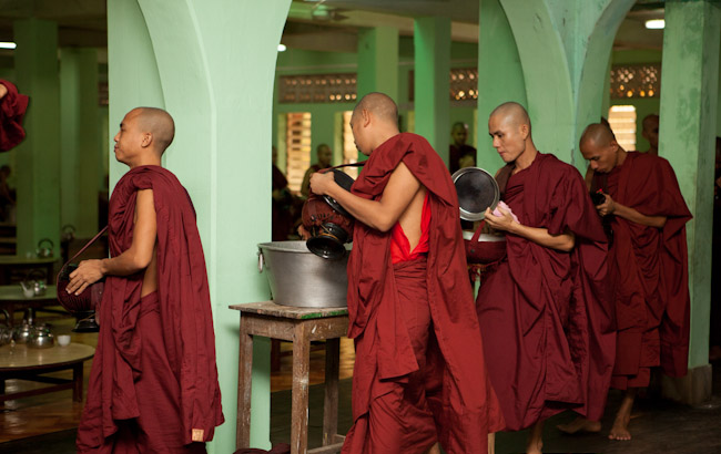Monks Emptying Their Alms Bowls After Lunch