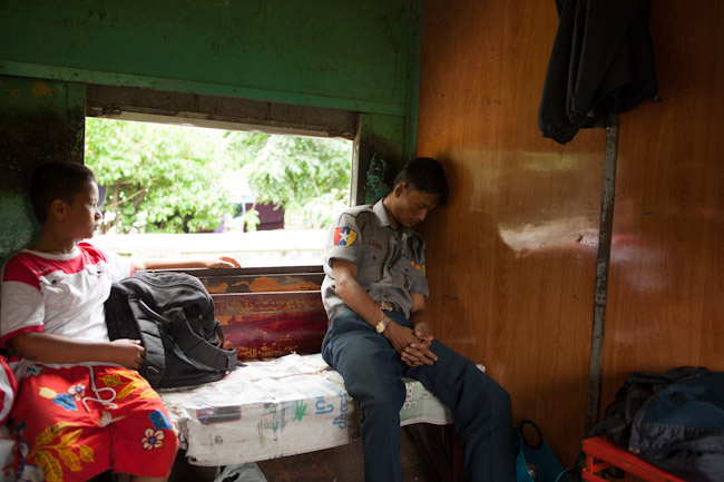 Guard Sleeping on the Yangon Circle Line Train